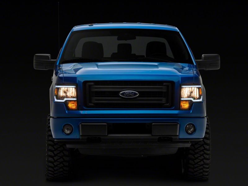 Raxiom 09-14 Ford F-150 Axial Series Faro con barra LED SEQL - Carcasa negra (lente transparente)