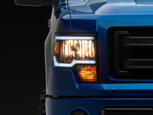 Raxiom 09-14 Ford F-150 Axial Series Headlight w/ SEQL LED Bar- Blk Housing (Clear Lens)