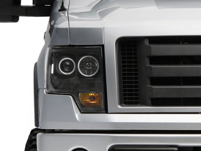 Raxiom 09-14 Ford F-150 Super White LED Halo Proyector Faros delanteros - Carcasa negra (lente transparente)