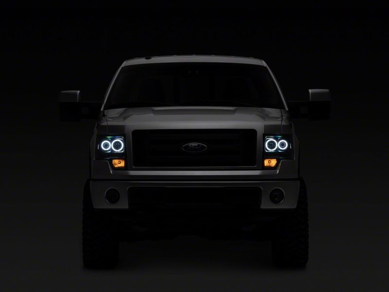 Raxiom 09-14 Ford F-150 Super White LED Halo Proyector Faros delanteros - Carcasa negra (lente transparente)