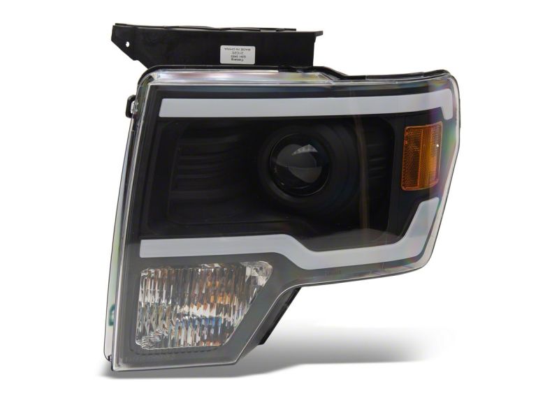 Raxiom 09-14 Ford F-150 Axial Series Projector Headlights w/ LED Light Bar- Blk Housing (Clear Lens)