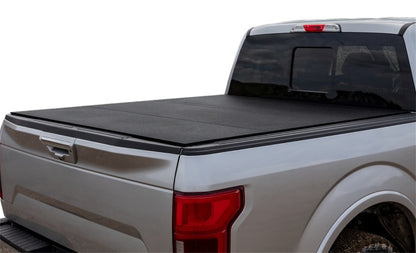 Access LOMAX Cubierta triple plegable Acabado de uretano negro 04+ Ford F-150 - Cama de 5 pies 6 pulgadas